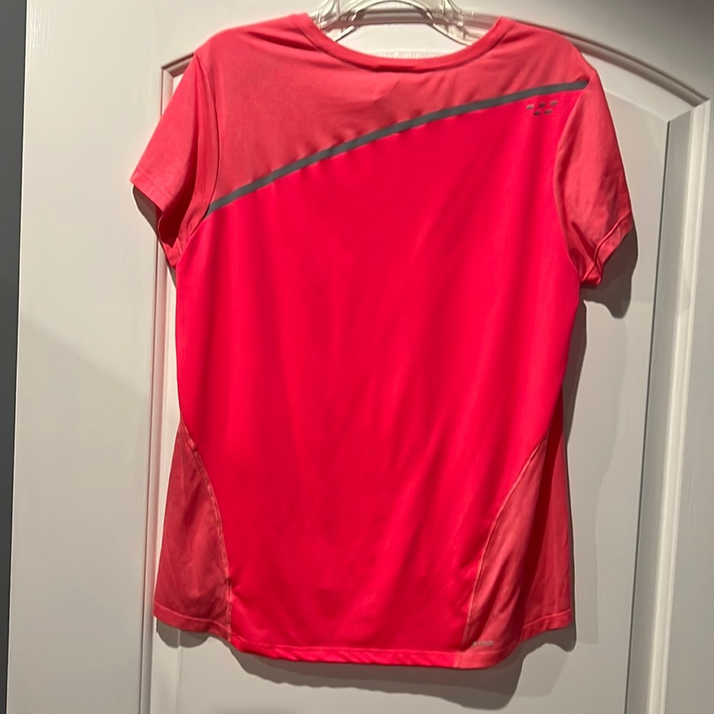 Size extra large light pink athletic shirt